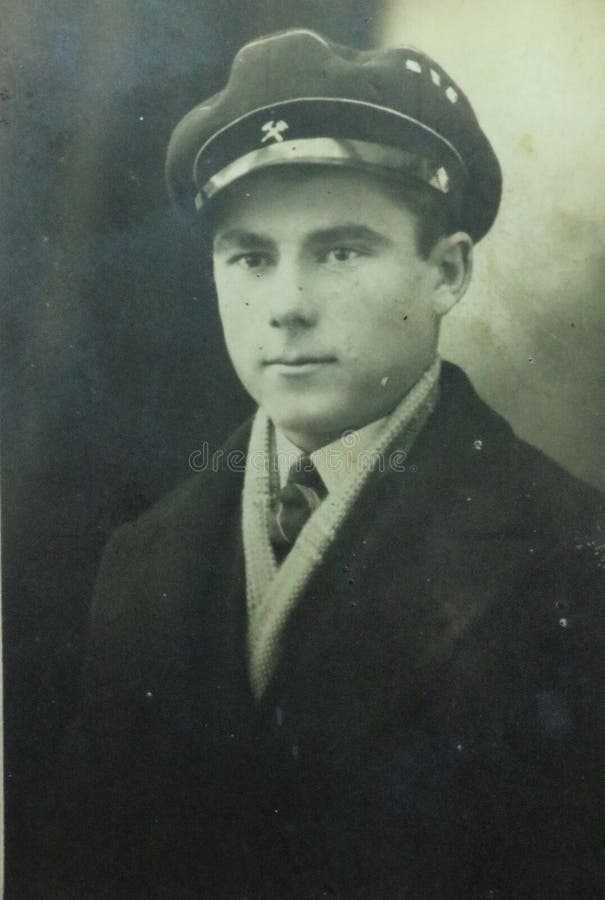 Vintage black and white photo of a young man in uniform, military interest, 1940s - 1950s family. 1950s fashion. Social history. Vintage black and white photo of a young man in uniform, military interest, 1940s - 1950s family. 1950s fashion. Social history.